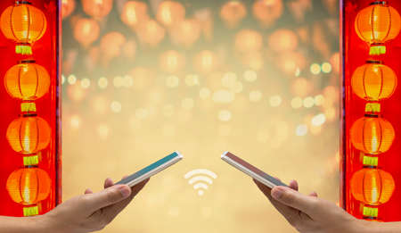 Chinese new year , Digital Hongbao or red envelope  are sending on cellphone.の写真素材