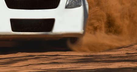 Rally race car drifting on dirt track.の写真素材