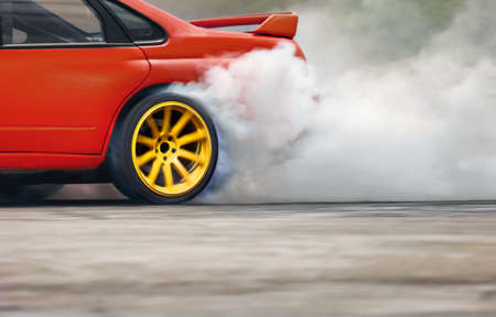 Close up drift race car increasing speed on drift playgroundの写真素材