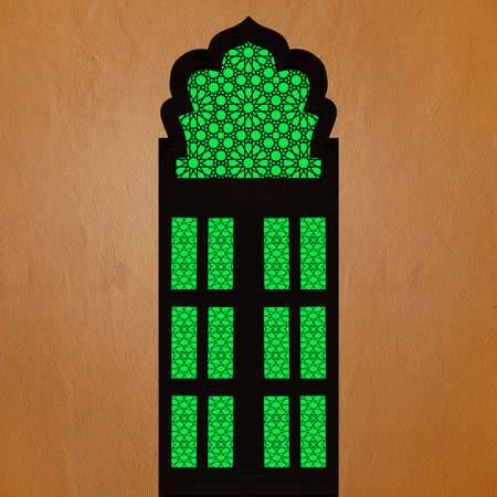Traditional Indian style window with orange concrete wallの写真素材