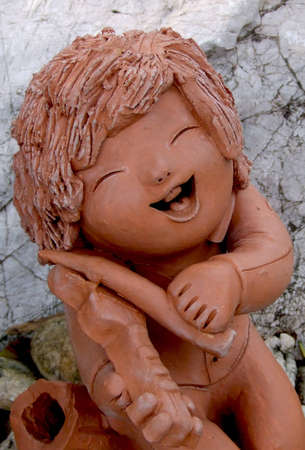 Smiley clay doll の写真素材