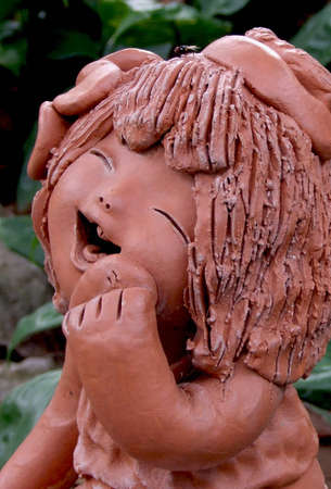 Smiley clay doll の写真素材