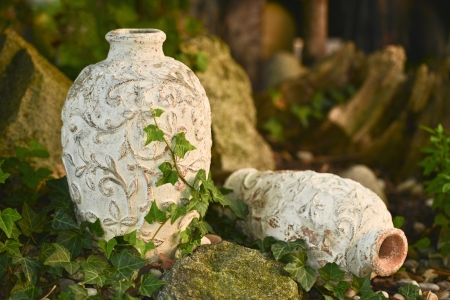 Terracotta vase in the rock gardenの写真素材