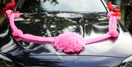 in front of luxury black car using for wedding dayの写真素材