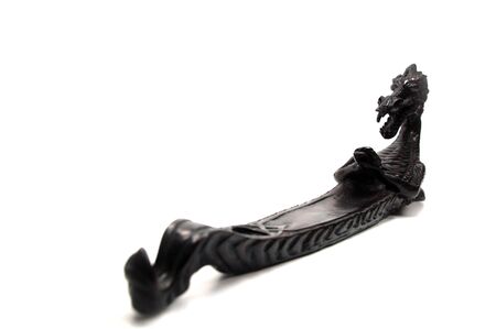 a black china dragon on white backgroundの写真素材