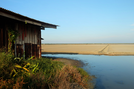 warehouse for save salt and Salt Filed, Na Klua, Phetchaburi, Thailandの写真素材