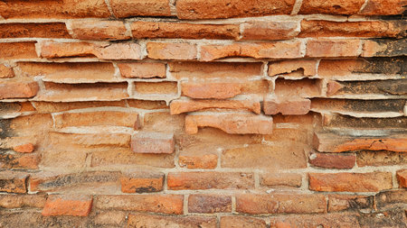 Old cement and brick wall background for decoration on rustic, old school and architecture concept.の写真素材