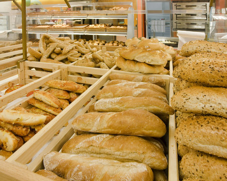 Loaves of bread on shelves in a store