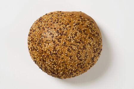Bread topped with flax and sesame seedsの写真素材
