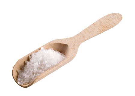 Sea salt on a wooden scoop isolated on whiteの写真素材