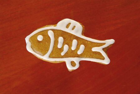 Gingerbread fish decorated with sugar icingの写真素材