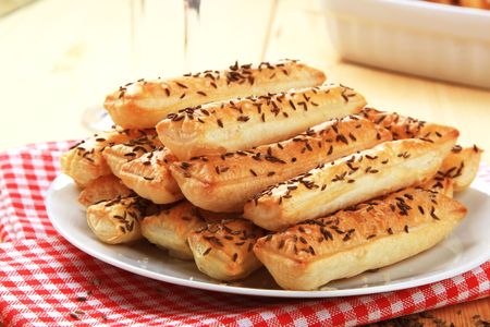 Crisp snacks with caraway seeds on topの写真素材
