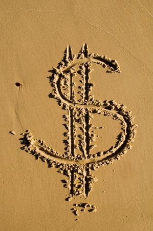 Dollar sign drawn in the sand の写真素材