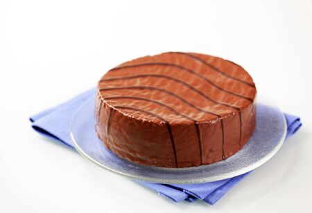 Nut cake glazed with chocolate icing 