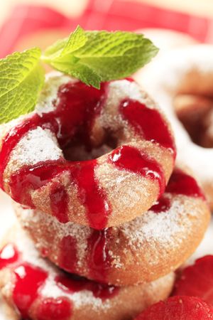 Ring doughnuts poured with sweet syrupの写真素材