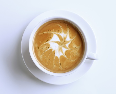 Cup of latte with froth art - overheadの写真素材