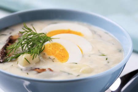 Sour cream soup with dill, mushrooms and potatoesの写真素材