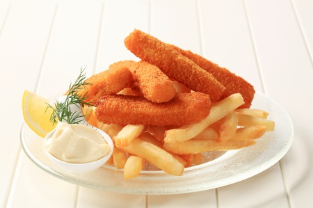 Fried fish sticks and French friesの写真素材