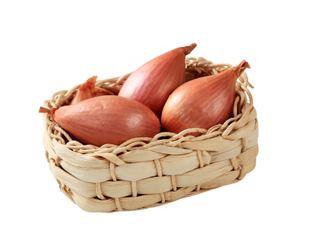 Bulbs of fresh onion in a basket