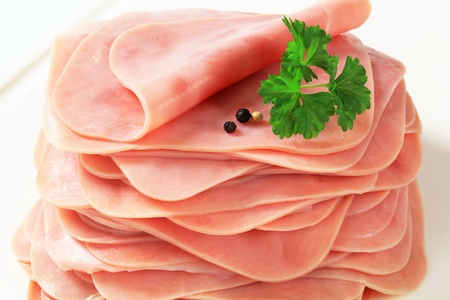 Stack of thinly sliced hamの写真素材