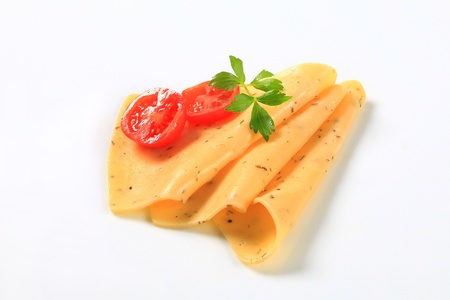 Thin slices of herb cheeseの写真素材