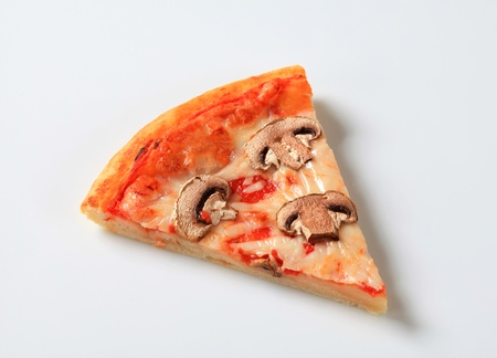 Pizza with mushrooms and mozzarellaの写真素材