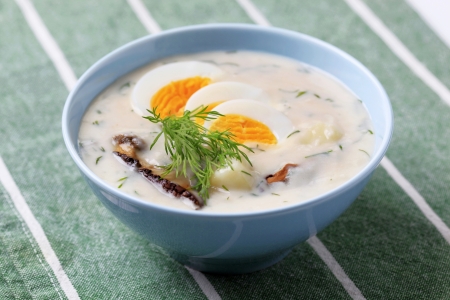 Cream soup with dill, mushrooms and eggの写真素材