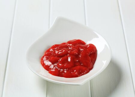 Hot sauce in a bowlの写真素材