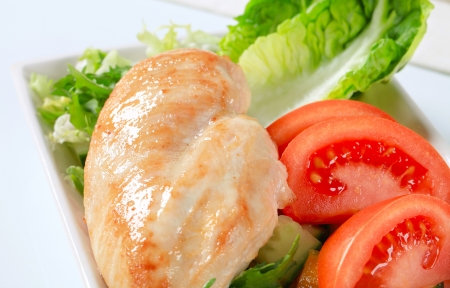 Chicken breast fillet with fresh vegetablesの写真素材