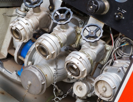 Fire valves at the rear of a fire engine