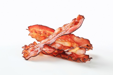Crispy pan-fried strips of baconの写真素材