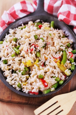 Vegetable fried rice on a frying panの写真素材