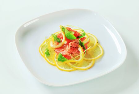 Beef Carpaccio on nest of thinly sliced lemonの写真素材
