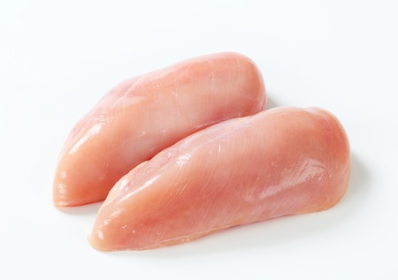 Raw skinless chicken breast filletsの写真素材