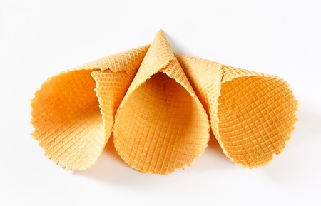 Waffle cornets on white backgroundの写真素材