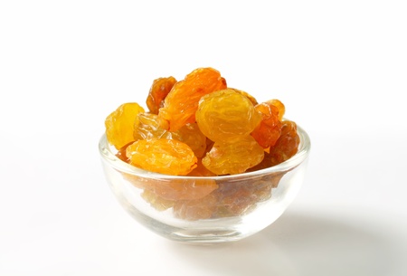 Sultana raisins in a small glass bowlの写真素材