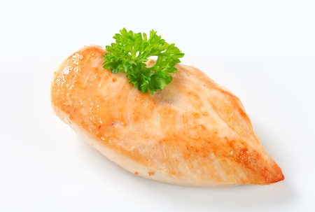 Studio shot of seared chicken breastの写真素材