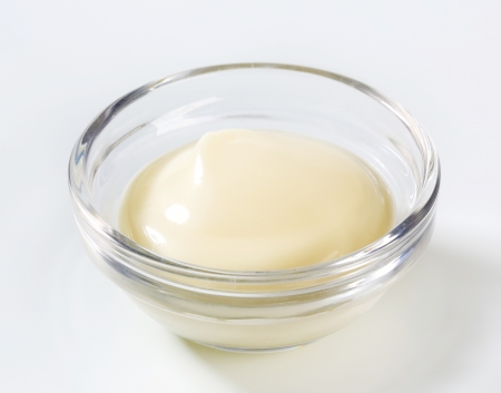 Glass bowl of mayonnaise sauceの写真素材