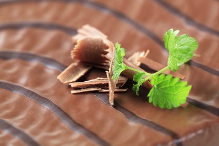Macro shot of chocolate glaze on a cakeの写真素材