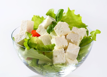 Green salad with feta cheese, tomatoes and pepperの写真素材