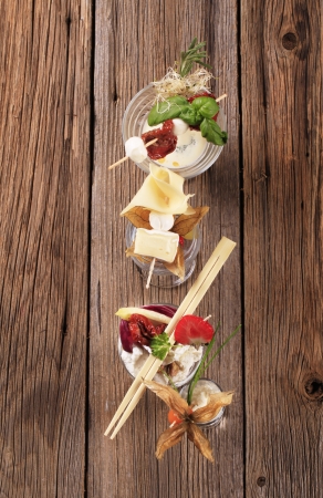 Cheese appetizers in glass dishes - overheadの写真素材