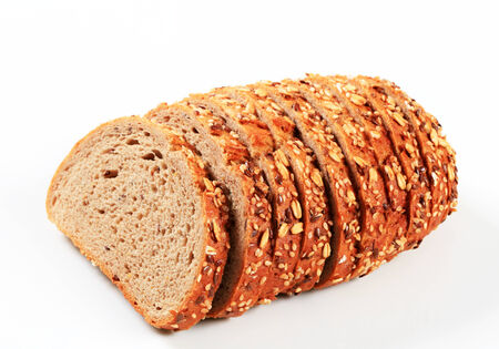 Sliced bread topped with flax and sesame seeds