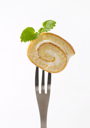 Sponge cake roll with cream fillingの写真素材