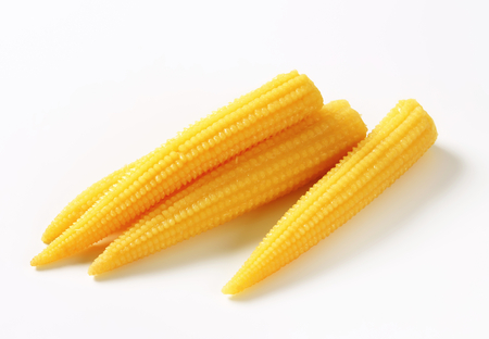 Pickled baby corn cobs - studio shotの写真素材
