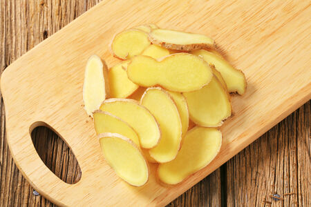 Fresh ginger root - thinly slicedの写真素材