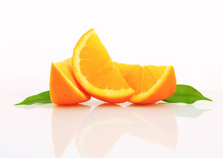 Studio shot of orange wedges