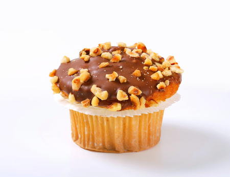 Hazelnut muffin with chocolate toppingの写真素材