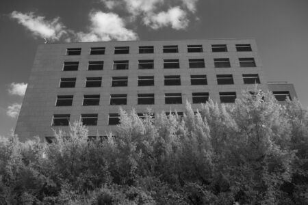 Black and white infrared shot of office building - view from below のeditorial素材