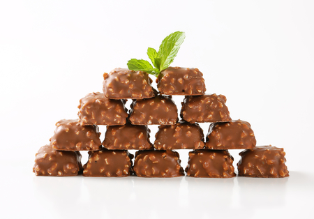 Marzipan nuggets covered with milk chocolateの写真素材