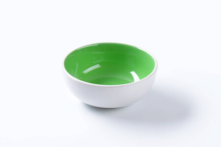 Empty ceramic bowl on white backgroundの写真素材